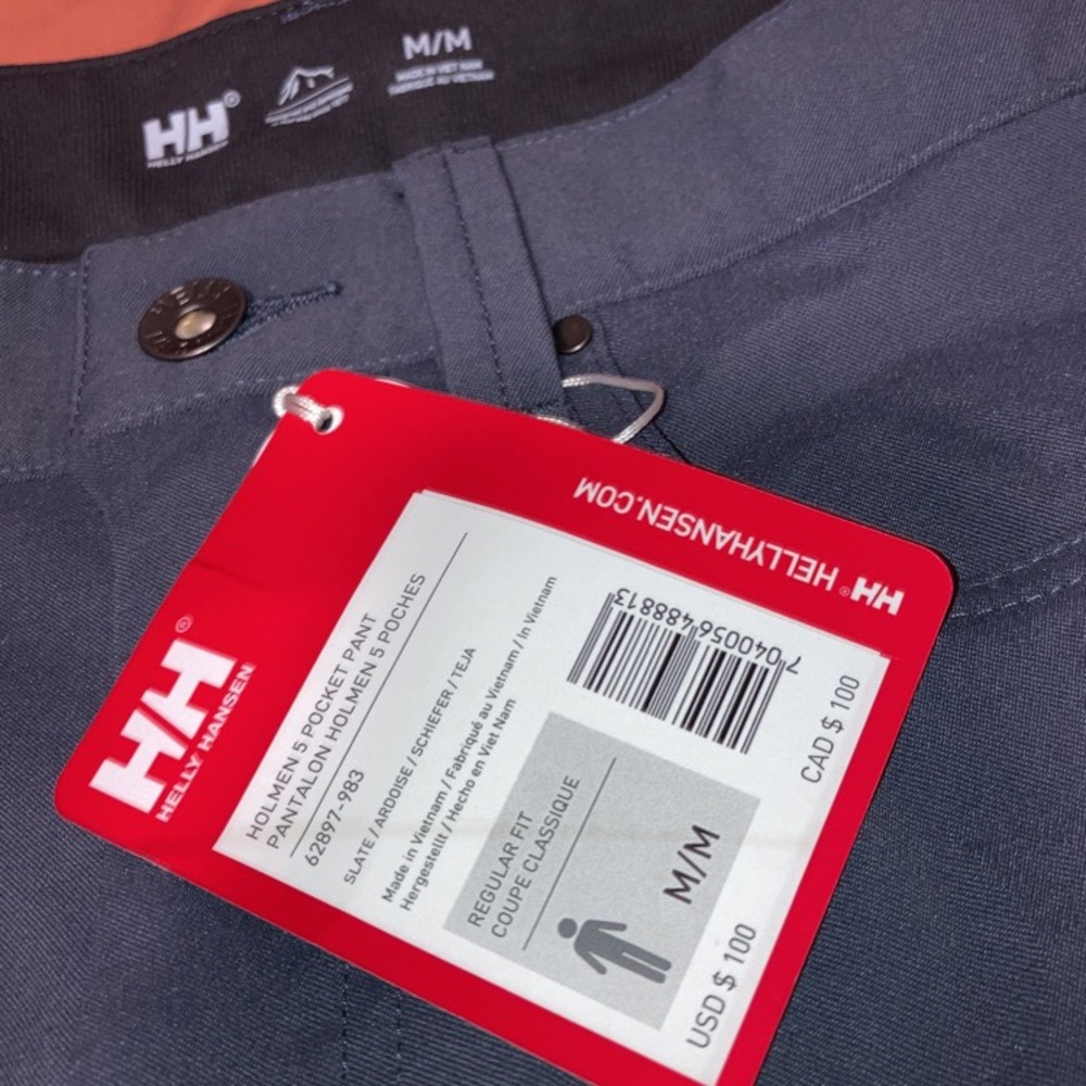 Helly Hansen waterproof lightweight pants. Size medium never been worn.